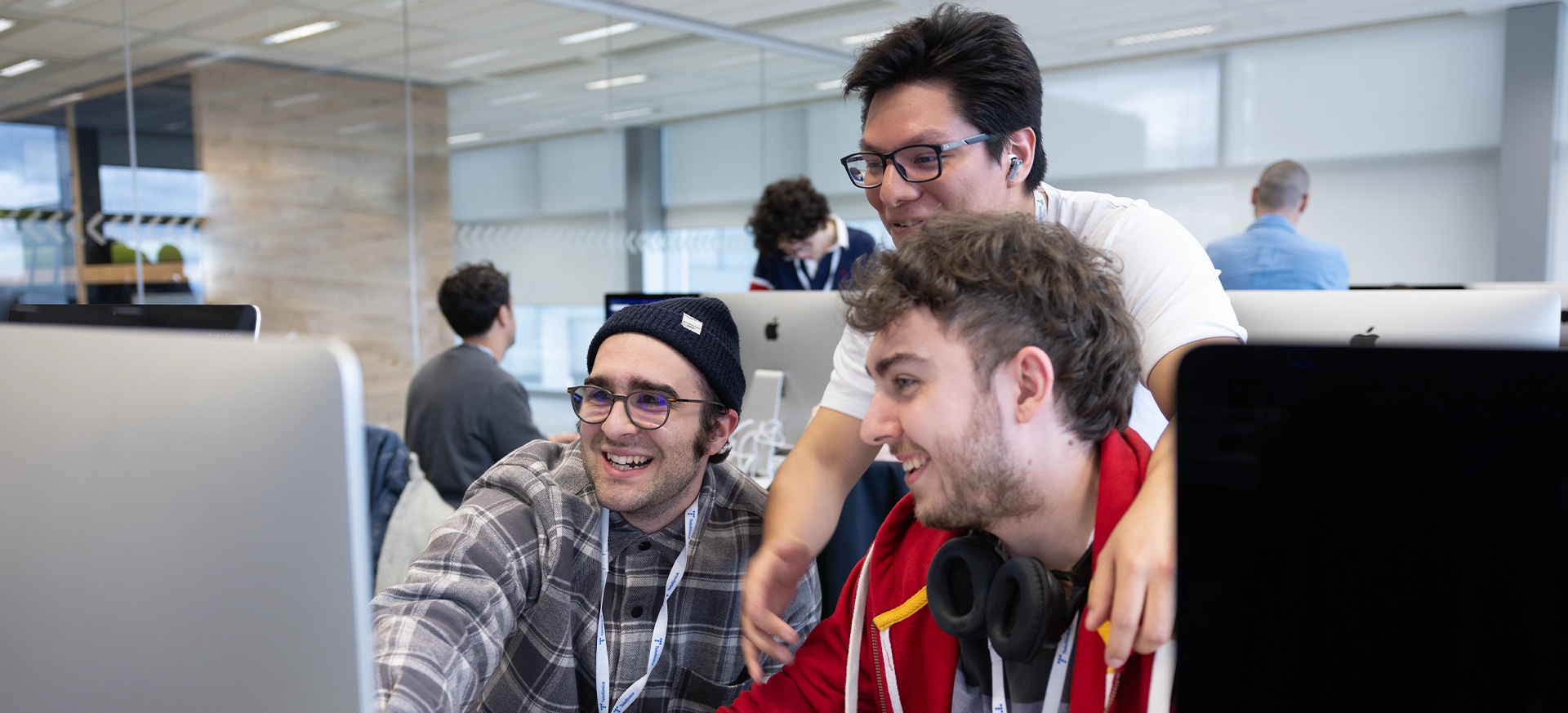 Students collaborate on a programming project in the 42 Madrid Fundación Telefónica cluster, working together through the campus's peer-to-peer learning methodology.