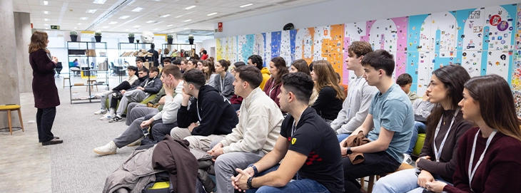 Vocational training students attend an Open Day presentation at 42 Madrid Fundación Telefónica to learn about its peer-to-peer programming and cybersecurity.